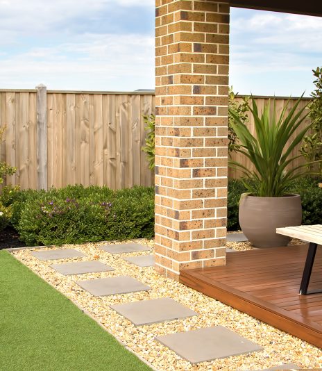 Combinations of artificial grass, paving tiles, decking, plants and pebble